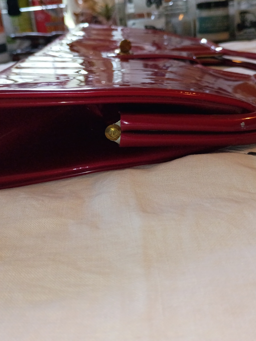 Glossy Red Patent Handle Clutch with Gold-Tone Hardware - Picture 10 of 14
